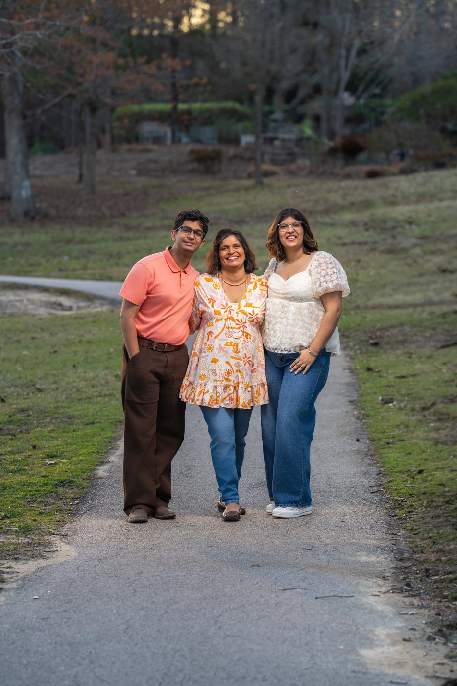 Aurita's family walking together on a path
